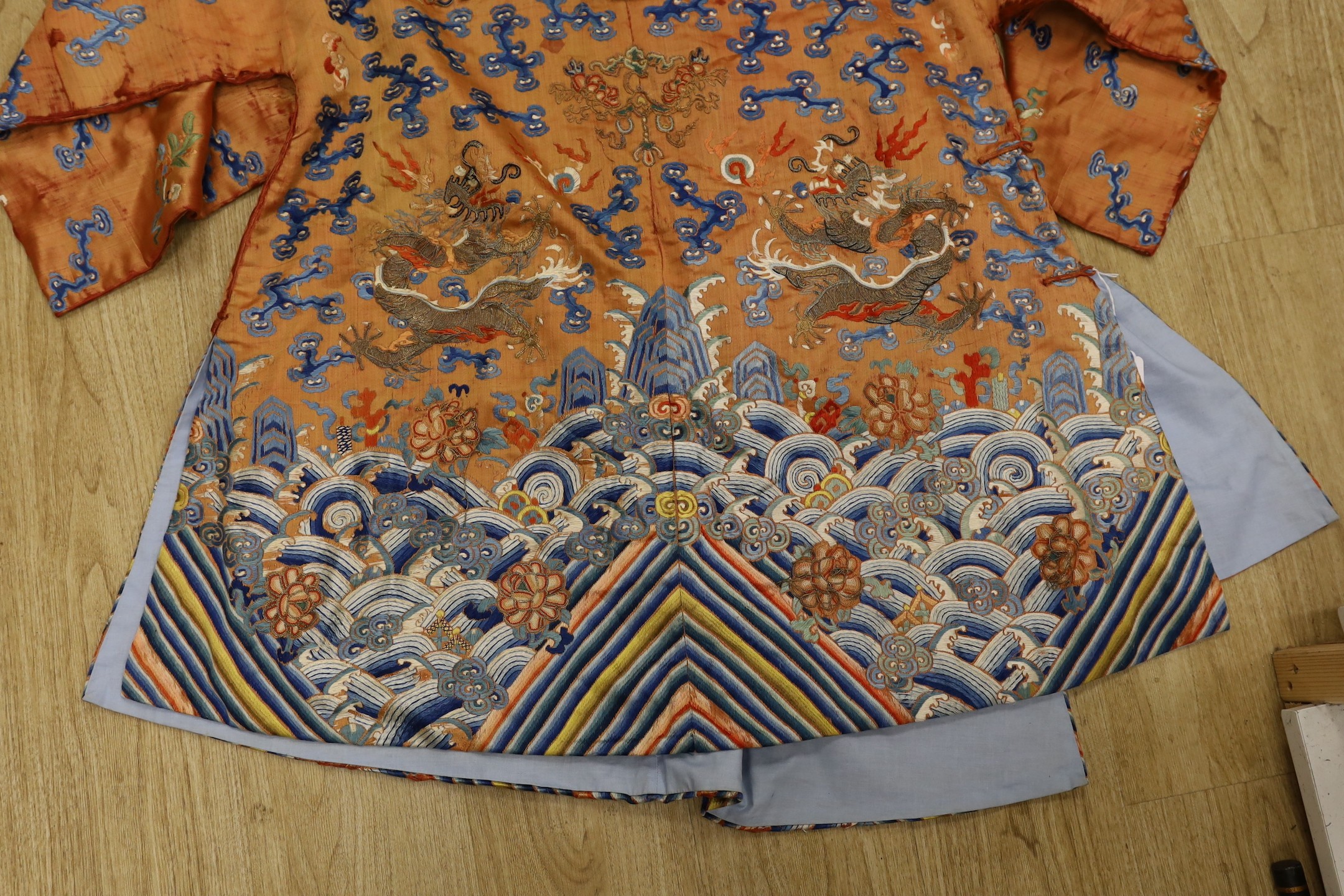 A Chinese embroidered silk dragon robe, late Qing Dynasty